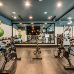 Elevate your fitness journey at Atlas North Lamar's cutting-edge fitness center! fitness center with exercise equipment