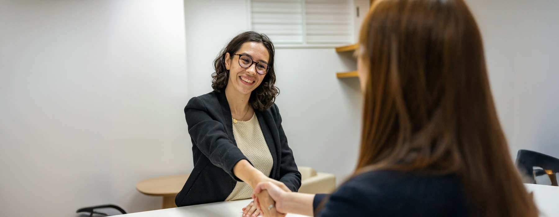 two people shaking hands
